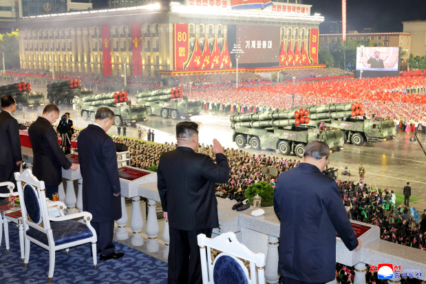 North Korea shows off new missiles in military parade